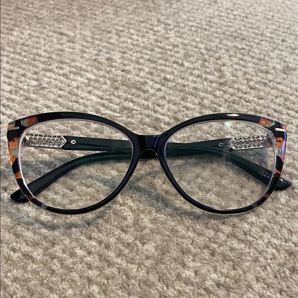 Woman’s Stylish Black and Silver Prescription Glasses with tortoises accents.